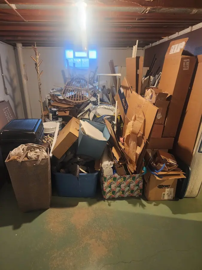 Roll-off dumpster container at job site for Construction Dumpster Rental in Hazel Park